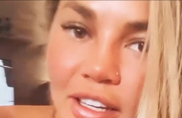 Chrissy Teigen gets her nose pierced - again