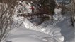 Guy Slips And Falls Under Bridge While Skiing On Handrails