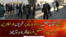 Clash between citizens and protesters at Shahra-e-faisal