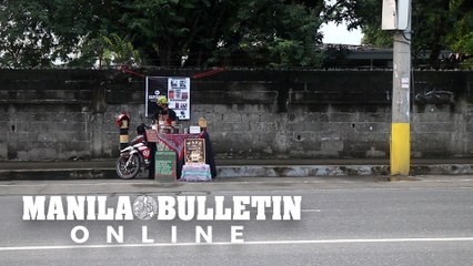 Artisan coffee maker sells coffee along the street in Lanang area of Davao