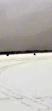 Wind Blows Ice Fishing Shanty Across Lake