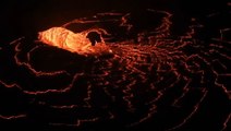 Lava spews in a 'dome fountain' at Mt. Kilauea's growing lava lake