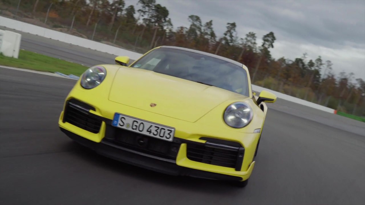 The new Porsche 911 Turbo in Racing Yellow Driving Video