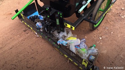 Doing Your Bit: Using a bicycle to sweep the streets