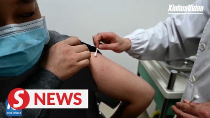 A close look at how Covid-19 vaccination is done in China’s Nanchang