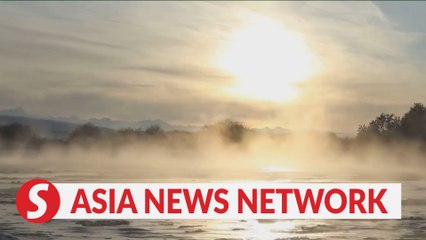 Breathtaking winter sunset in Xinjiang wetland park