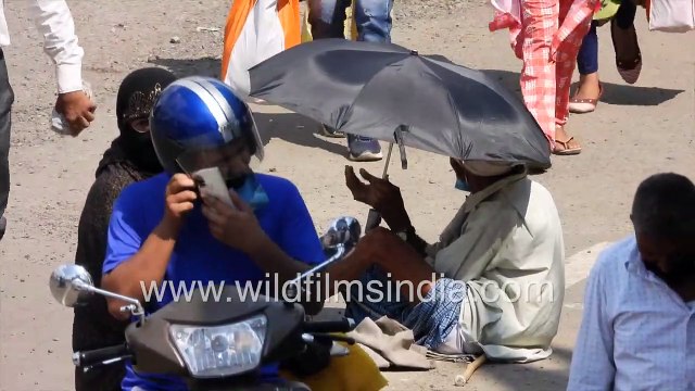 Limp father drags paralytic son with cart while begging _ Beggars in India