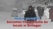 Heavy snowfall becomes troublesome for locals in Srinagar