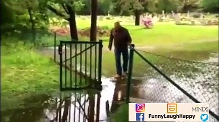 Humorous Grandpa jumping through fence