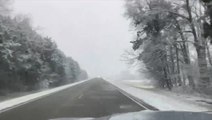 Driving through beautiful wintry scenery