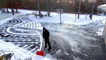 Guy Creates Art on Driveway by Shovelling Accumulated Snow Artistically