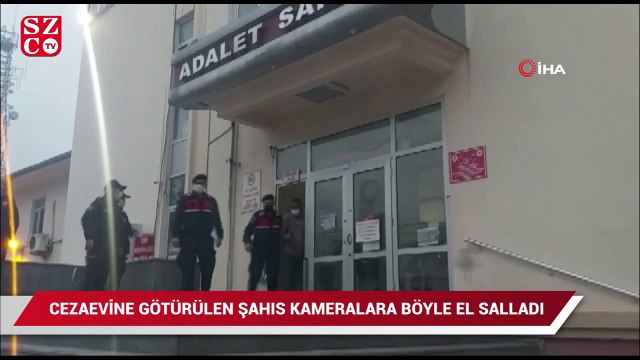 27 yıl hapis cezası bulunan firari cezaevine götürülürken el salladı