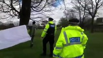 Police confront asylum seekers protesting outside Kent barracks