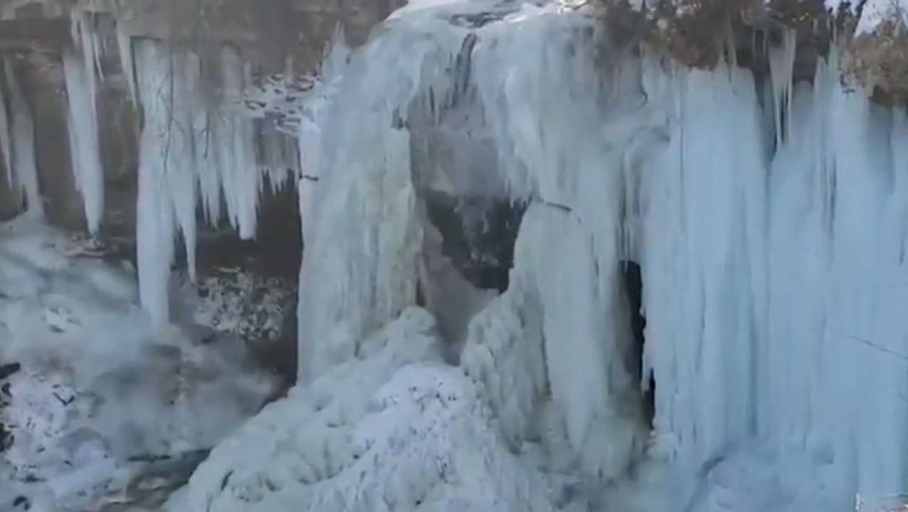 Minnesota waterfall ices over creating stunning scene