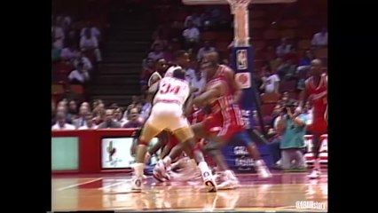 Hakeem Olajuwon scores 34 points and records 8 steals against the Clippers