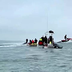 Dude Skis on Mountainous Waves