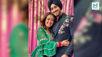 Neha Kakkar and Rohanpreet Singh pose as they celebrate their first Lohri