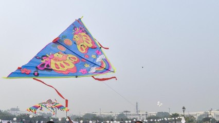 What is the political angle of Gujarat and Ahmedabad kites?
