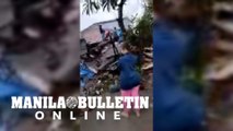 UGC- Damaged buildings and roads after Indonesia earthquake