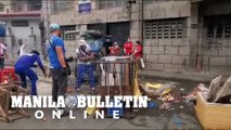 Moriones Police conducts a clearing operation beside Sto. Niño Church in Tondo, Manila earlier