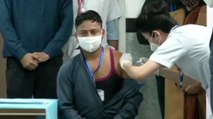 AIIMS sanitation worker takes first shot of Covid Vaccine