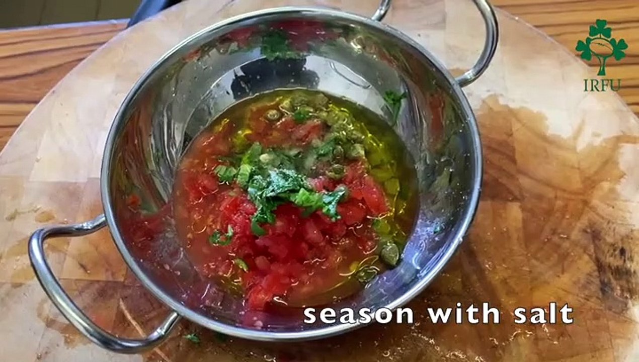 Pan-fried Hake with cauliflower leaves, capers and tomatoes