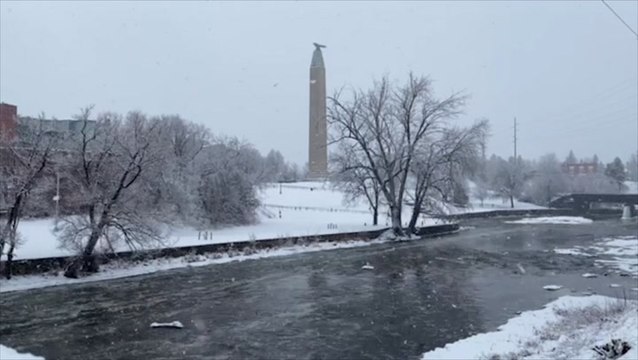 Snow backs down, but leaves landscape coated