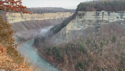 Water vapor forms misty ‘clouds’ over New York’s Genesee River