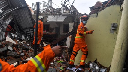 Indonesia quake toll hits 56 as rescuers race to find survivors