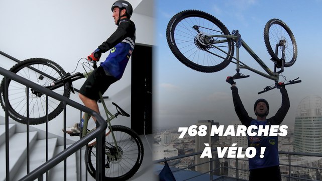 Aurélien Fontenoy a grimpé une tour de La Défense... à vélo !