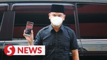 Sg Besar Umno chief Jamal Yunos claims trial to two counts of sharing offensive content
