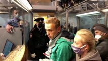 Kremlin critic Navalny detained as he returns to Russia