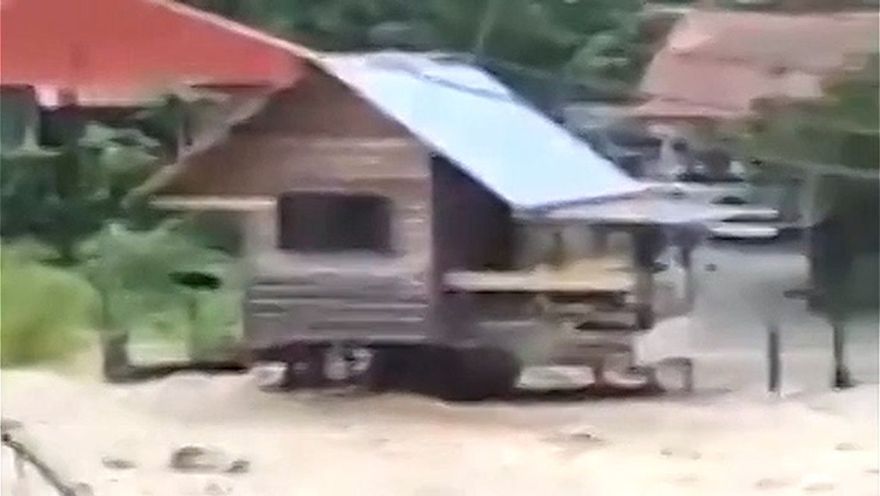 Heavy rain triggers widespread flooding in Malaysia