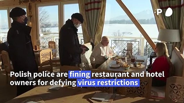 Businesses in Polish mountain town defy virus restrictions and re-open