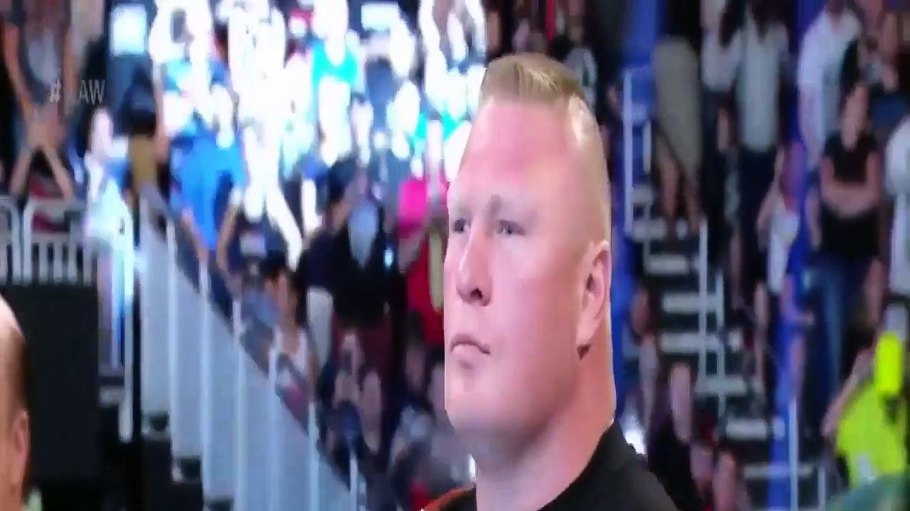 Kane attacks Brock Lesnar and Strowman