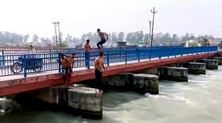 Boys Jumping From Ganga Canal