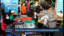 Kasus Covid 19 Meningkat, Polisi Bagikan Masker Gratis Ke Warga