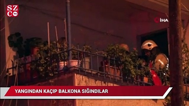 Alevlerin yükseldiği dairede mahsur kalan vatandaşlar balkona sığındı