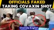 Tumkur officials fake receiving vaccine shots: Video goes viral | Oneindia News