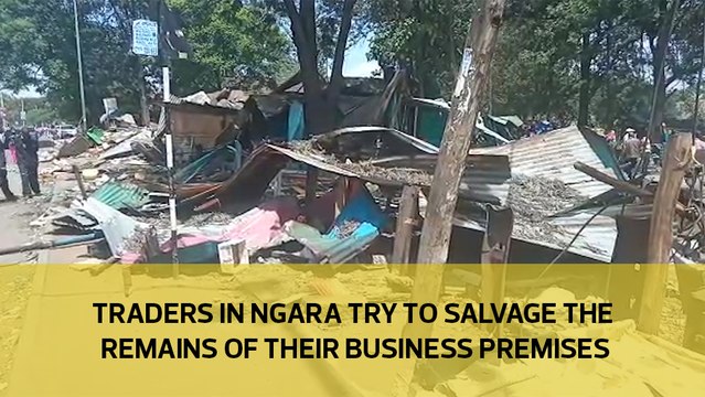 Traders in Ngara try to salvage the remains of their business premises