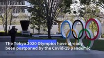 Japan dismisses Olympics cancellation report as teams back Games