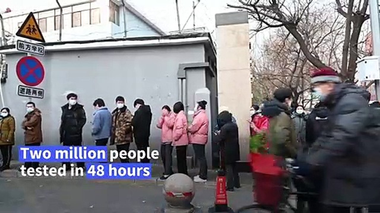 Long queues in Beijing as mass testing launched to stem virus outbreak