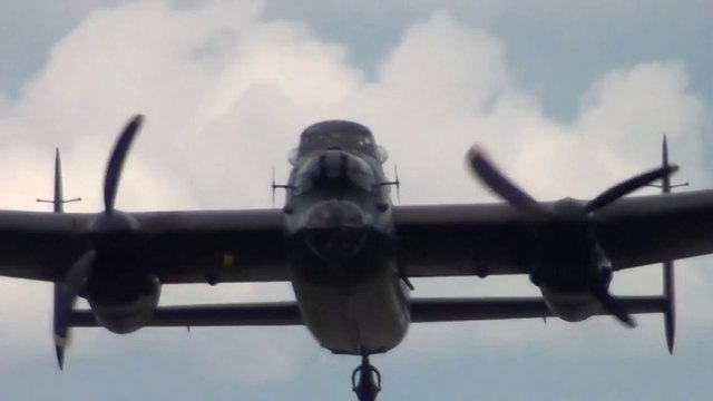 Powered by Rolls-Royce engines Fortress Lancaster Bomber in the sky Flight while maintaining,WW2 condition.