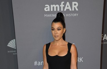 Kourtney Kardashian romancing Travis Barker?