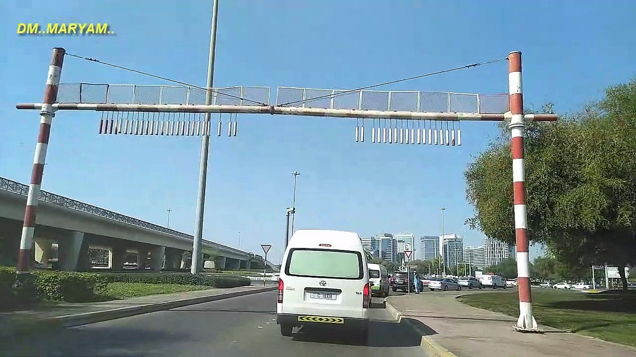 uae | dubai | Road leading through sand dunes in the desert of Liwa Oasis United Arab Emirates