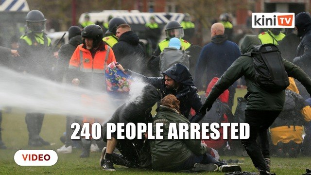Dutch police detain 240 nationwide as anti-lockdown protests turn violent
