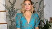 Kate Hudson hides from family in bathroom