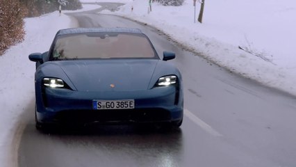 The new Porsche Taycan in Neptune Blue Driving Video