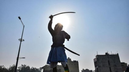 Situation tense as farmers try to attack police with swords
