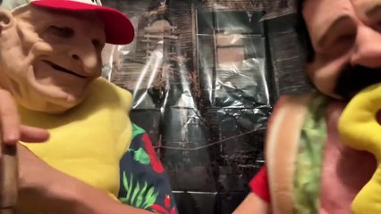 Reviewing a cellphone stand from the Dollar Tree